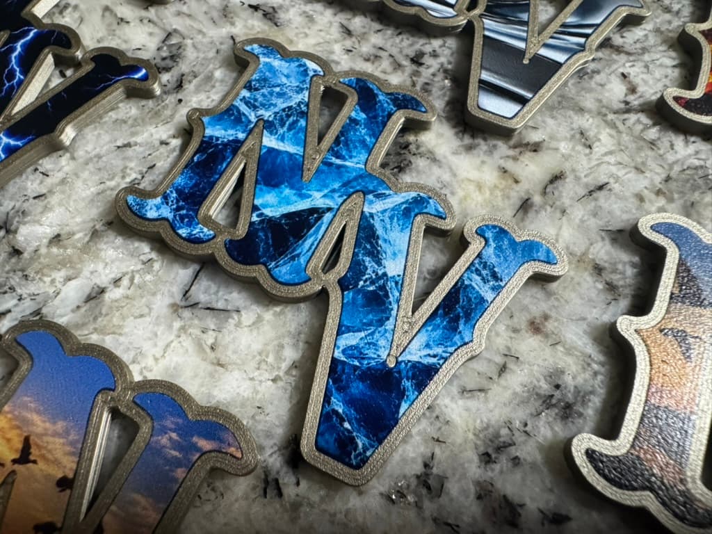 Raised NV helmet decal with blue ice artwork