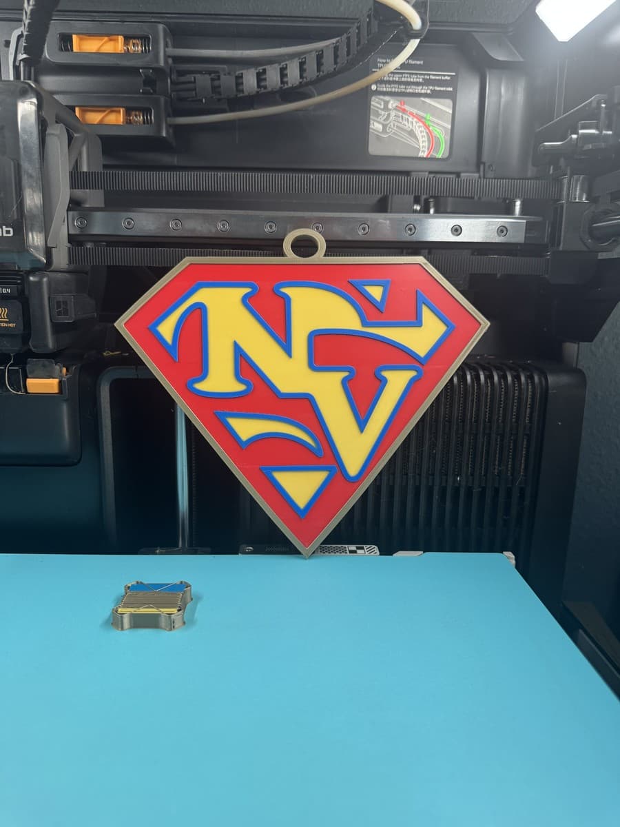 Red and blue NV shield-shaped hype-chain pendant