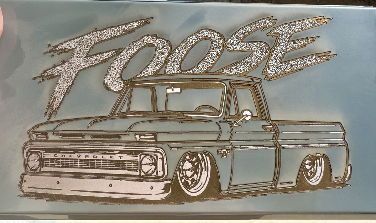 Mini toolbox engraving detail showing truck artwork and Foose lettering